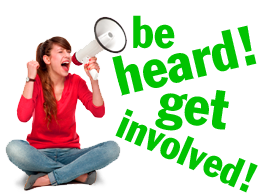 Young woman yelling into a megaphone